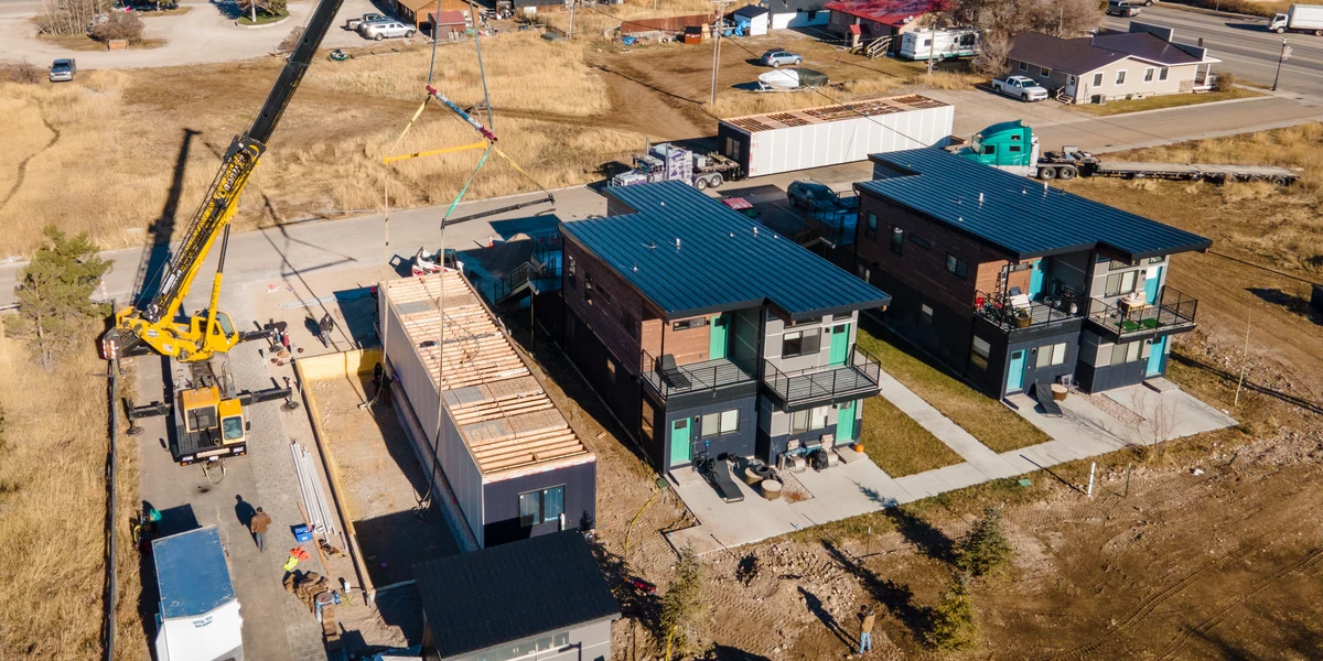Aerial photo of modules being set at Westgroup employee housing in Victor, Idaho