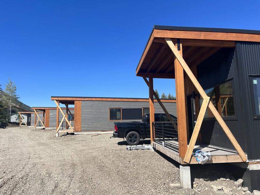 Single-story Ridgeline homes with timber porches, firefighter housing in Sun Valley, Idaho
