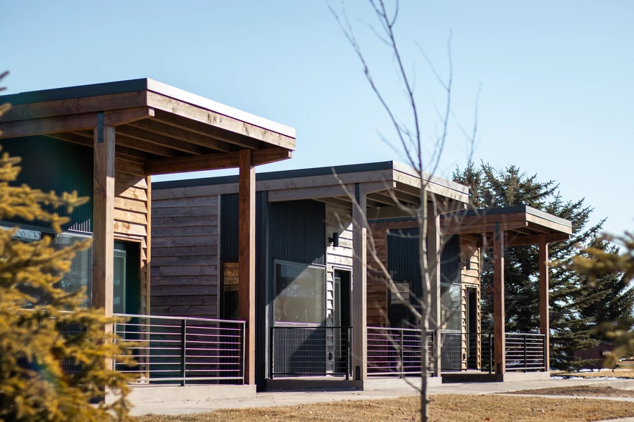 Single-story Ridgeline porches in a row at Tributary in Driggs, Idaho