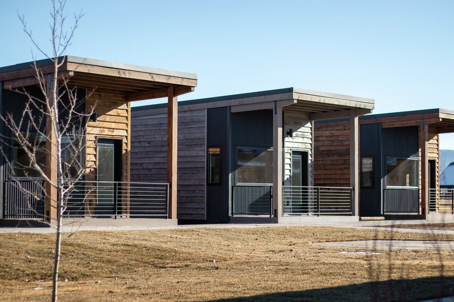Three single-story Ridgeline homes with covered porches at Tributary in Driggs, Idaho