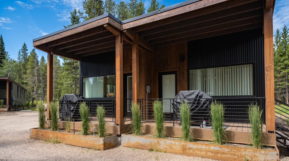 Two covered cedar porches on a finished modular rental in Island Park, Idaho