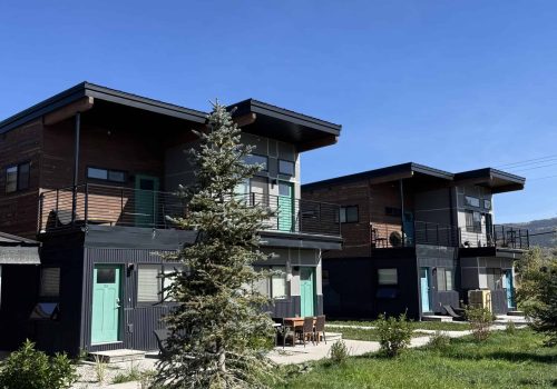 Prefab mountain homes with sleek design and eco-friendly features.