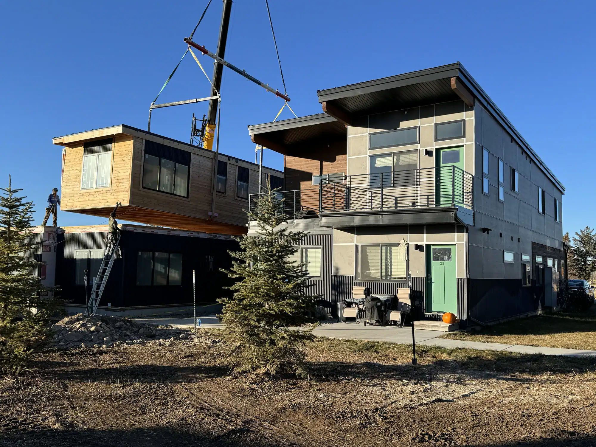 Module lifted onto a two-story building at Westgroup employee housing in Victor, Idaho